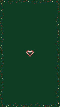 a green square with red and white hearts on it