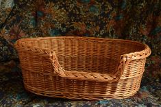 a wicker basket sitting on top of a couch