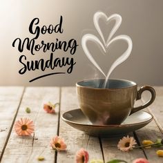 a coffee cup with steam rising out of it and the words good morning sunday written in black