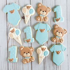 teddy bear cookies are arranged in the shape of numbers for baby ones first birthdays