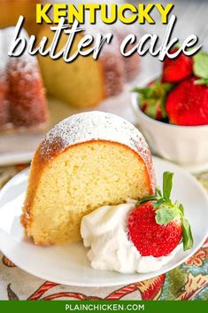 a piece of pound cake on a plate with whipped cream and strawberries next to it