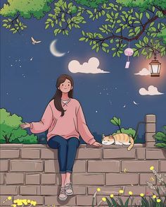 a woman sitting on top of a brick wall next to a tree and a cat