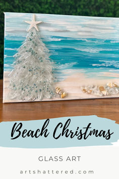 a christmas tree painted on canvas with the words beach christmas glass art