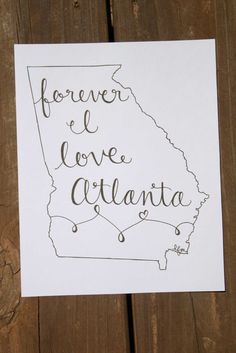 a piece of paper that says forever i love atlanta