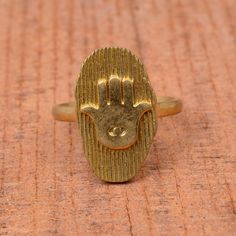 "Gold Hamsa Ring, Brass Ring, Hamsa Jewelry, Sideways Hamsa Ring, Hand of Fatima Ring, Evil Eye Ring, Gift For Her, Vintage Ring, Gift Item ❥ Add this beautiful one little thing of galactic shine to make you feel unique and to transform your lives. Perfect for any kind of outfit and every occasion. ❥ Customers satisfaction is our biggest priority, please contact us with any questions/queries for future or existing orders, and we will do our best to make sure you are happy with your order. ❥Pleas Symbolic Adjustable Engraved Open Ring, Symbolic Hand Forged Open Ring, Spiritual Metal Wedding Rings, Hand Forged Open Symbolic Ring, Handmade Spiritual Crystal Toe Ring, Symbolic Hand Forged Ring Jewelry, Symbolic Hand Forged Engraved Ring As Gift, Symbolic Hand Forged Engraved Ring For Gift, Symbolic Hand-forged Engraved Ring As A Gift