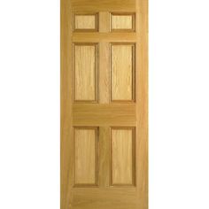 a close up view of a wooden door with four panels on the front and side