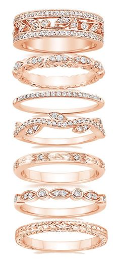 a stack of rings with diamonds on each one and the other in rose gold tone