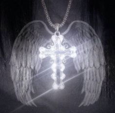 a cross with angel wings on it is glowing in the dark, and appears to be shining