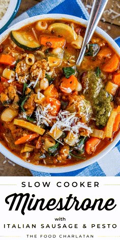 a white bowl filled with pasta and veggies soup next to a blue towel