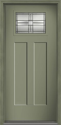 a green front door with blinds on the top and side panels, in an empty room