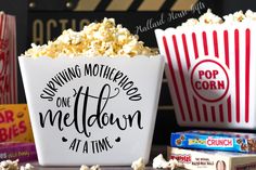 two popcorn buckets with the words saving motherhood one mellow at a time