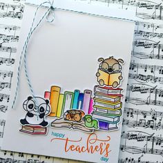 a teacher's day card with panda, bear and books on top of sheet music