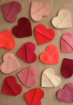 felt hearts laid out on a piece of cloth