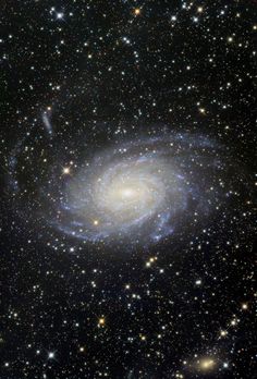 an image of a spiral galaxy in the sky