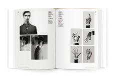 an open book with black and white photos on it's pages, showing hand gestures