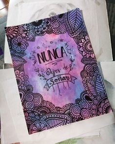 a piece of paper with the word nunca on it and an image of a flower