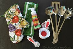 various kitchen utensils are laid out on a table