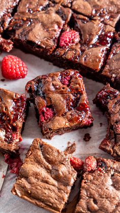 chocolate raspberry brownies cut into squares on a table