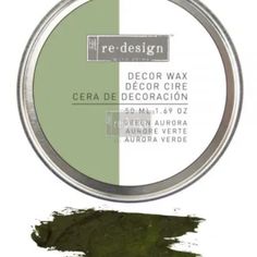 a tin of green paint with the words decor wax on it