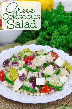 greek couscous salad with cucumbers, tomatoes, olives and feta cheese