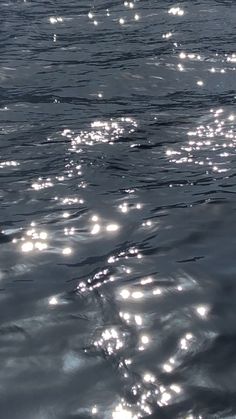 the sun shines brightly on the water as it reflects off the surface of the water