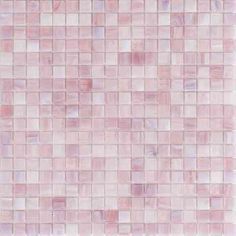 a pink tile wall with small squares on it