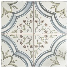 an artistic tile design with flowers and leaves