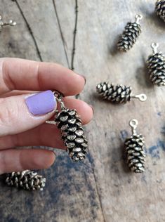 I live in upstate NY, and pinecones are everywhere🌲 The main purpose of a pinecone is to keep the seeds of the tree safe, which is why it is shaped with it's scales closely in and down. As with most things in nature, they're beautiful and perfectly designed This pendant is made out of antique brass and copper. Up close, it's very realistic looking and larger than the other designs I've seen on Etsy. The pendant measures about 2 inches in height and looks amazing on a long chain so you can fidge Pine Cone Jewelry, Pinecone Necklace, Tree Necklace, Long Chain, Tree Farms, Pine Cones, Antique Brass, Winter Wedding, Necklace Etsy