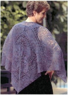 a woman wearing a purple lacy shawl