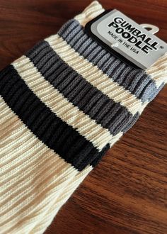 Takin' it back to the '70s and '80s with these retro socks! Features a more relaxed fit for ultimate comfort and a gentle feel around the calf. Wear them pulled up or scrunched down. Made of natural cotton with accents of black, granite, and grey nylon. Super comfy, unisex, one-size-fits-most, and made in the USA. Note: Cream portion is made of natural cotton, so lil darker specks in the fabric will occur. Features: Unisex Gym Crew Socks Wide Rib knit Cushioned foot = extra comfort! Seamless toe Retro Socks, Retro Gym, Ankle Length Skirt, Black Granite, Sock Gifts, Crew Socks, Natural Cotton, Black Grey, New Outfits