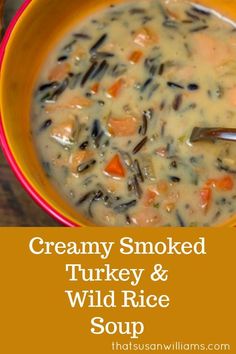 creamy smoked turkey and wild rice soup in a yellow bowl