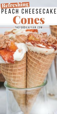 three cones filled with peach cheesecake ice cream on top of a glass cake stand