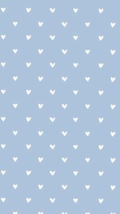 a blue background with white hearts on it