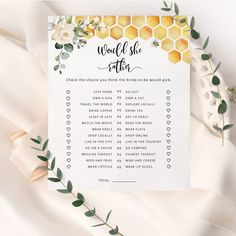 a printable wedding game with flowers and honeycombs on it's side