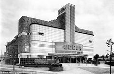 an old black and white photo of a building