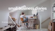 a woman sitting at a desk in front of a window with the words small business diaries on it