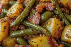 green beans and potatoes with bacon in a bowl