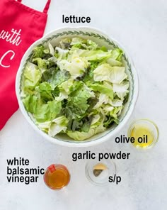 a bowl of lettuce next to a red bag with the ingredients in it