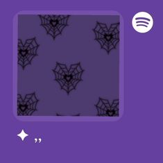 a purple background with black spider webs on it