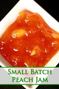 small batch peach jam in a square white bowl on a black background with the words, small batch peach jam