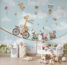 a child's room with toys and wallpaper in the shape of animals on a bike