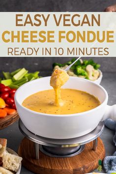 a bowl of cheese fondue with a spoon in it and the title overlay reads easy vegan cheese fondue ready in 10 minutes