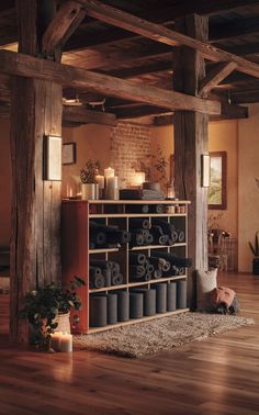 A rustic yoga studio with cozy, organized yoga mat storage. Mat Storage Ideas, Yoga Storage Ideas, Yoga Studio Design Interiors, Yoga Studio Design Ideas, Yoga Studio Interior, Cozy Yoga, Yoga Storage, Yoga Background, Gear Room