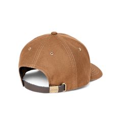 Our classic Dry Tin Logger Cap is made from the strong canvas that’s held back abrasion, punctures, and wear in Pacific Northwest backcountry for decades. Unwaxed, it’s well suited to year-round wear in drier weather. The adjustable leather backstrap assures a custom fit, and embroidered eyelets in the crown help spill excess heat. Subtle Filson logo embroidered on front. | Filson Dry Tin Cloth Logger Cap Whiskey Body Size, Pacific Northwest, The Crown, Logo Embroidered, Custom Fit, Whiskey, Tin, Heat, Crown