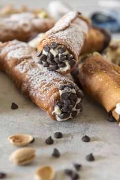 chocolate chip covered crepes are sitting on a table