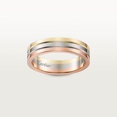 two tone gold and silver wedding band with the word's name engraved on it