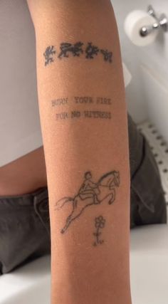 a person with a tattoo on their arm that says, sorry you are for my horses