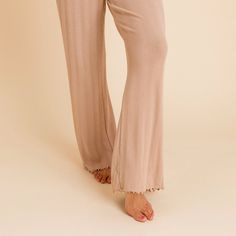 Meet the loungewear pants of your dreams! Our Women's Straight Leg Pointelle Pants are made from our soft and stretchy pointelle viscose from bamboo fabric, keeping you comfortable while adding a dainty, elegant feel. The elastic waistband will keep you comfy all day, while the straight-leg pant gives a flattering, modern silhouette. At the hem is a darling lettuce edge detail for added charm and feminine flair. You'll reach for these cozy and cute pointelle pants whenever you come home! Complet Pointelle Pants, Loungewear Pants, Travel Cubes, Posh Peanut, Solid Brown, Bamboo Fabric, Come Home, Straight Leg Pants, New Moms