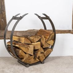 a stack of firewood in a metal holder