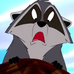 a cartoon raccoon with its mouth open